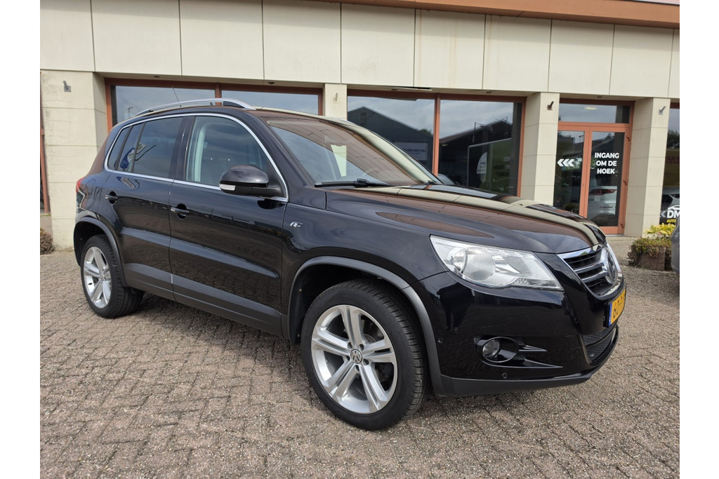Volkswagen Tiguan 1.4 TSI Sport & Style | Park Assist | airco | Cruise | Trekhaak 53603026-0.jpg | DMC Automotive