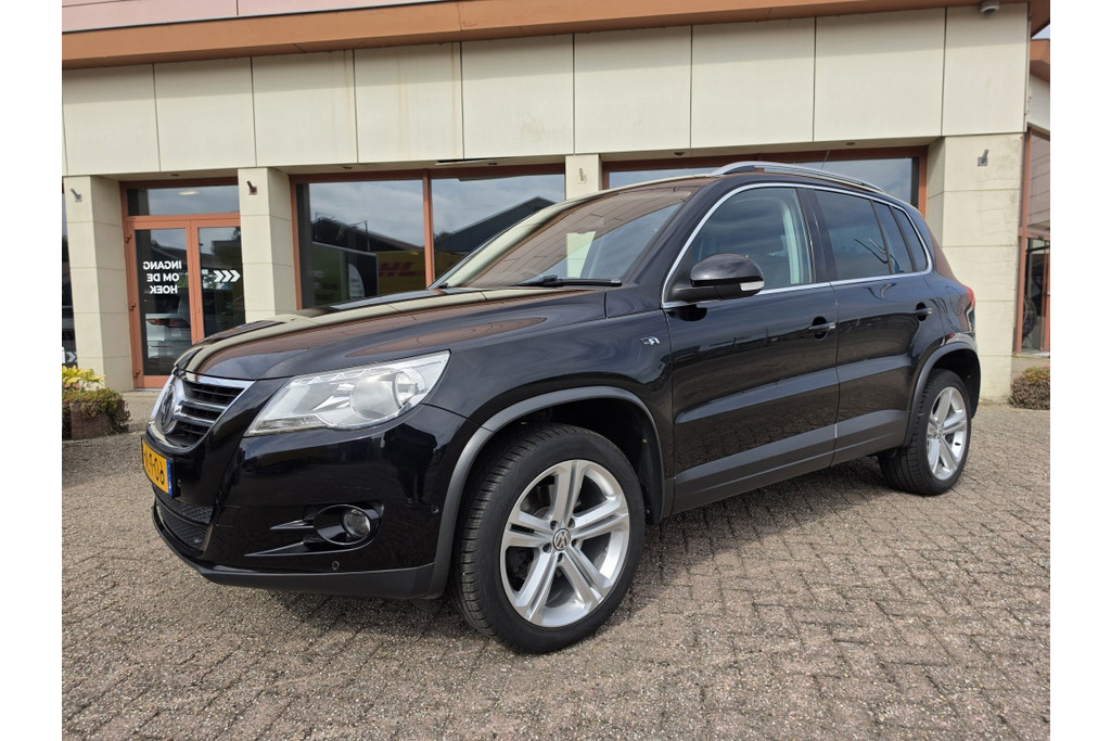Volkswagen Tiguan 1.4 TSI Sport & Style | Park Assist | airco | Cruise | Trekhaak 53603026-0.jpg | DMC Automotive